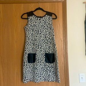 Leopard print dress with faux leather pockets